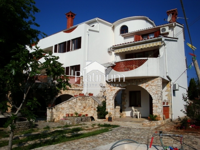 Apartment house with a large garden